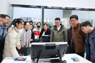 柳州铁一中学和防城港市北部湾高级中学到米乐官网调研交流