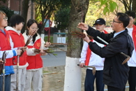 米乐官网师生共同开展2026年“‘植’此青绿，绿动校园”活动