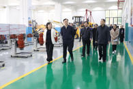 自治区政府副主席黄俊华莅临米乐官网调研